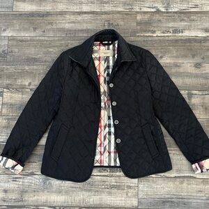 Black Burberry Coat. No stains or damages. Excellent condition.